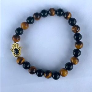 Hamsa bracelet with tiger eyes